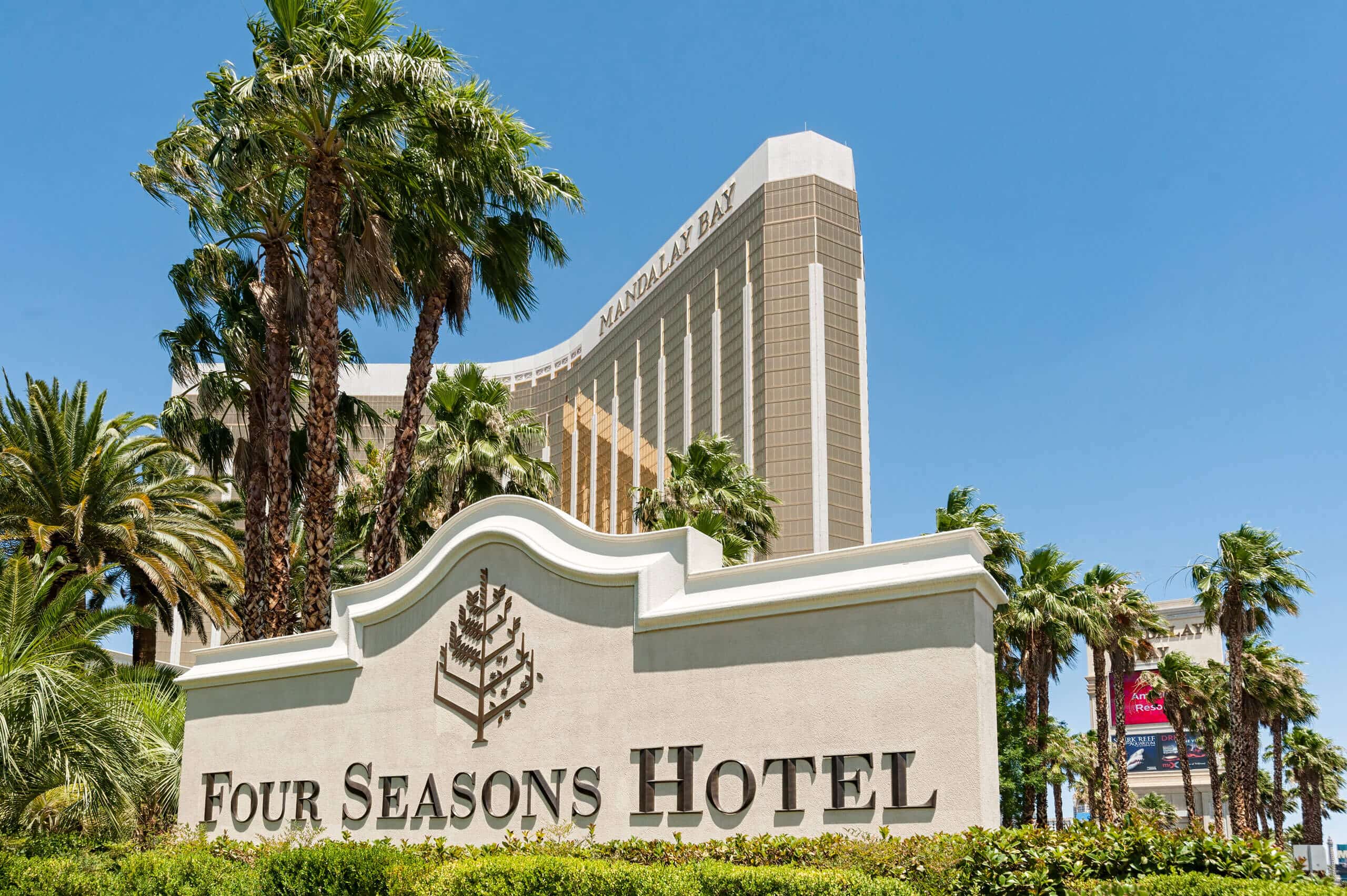 Ouside of a large hotel called Four Seasons Hotel